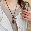 New Chinese Ethnic Style Wooden Heart Gourd Pendant Wax Cord Sweater Necklace For Women view 3