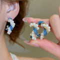 Faux Pearl C Shape Denim Twist Stud Earrings For Women Light Luxury Geometric Style view 2