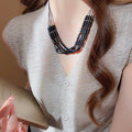 Light Luxury Acrylic Round Bead Pendant Necklace With Cotton Cord Retro Ethnic Collarbone Chain view 1