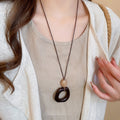 Vintage Ethnic Wood Resin Oval Geometric Pendant Sweater Necklace For Women view 3