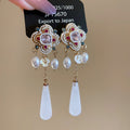 Court Style Pearl Flower Resin Teardrop Drop Earrings With Silver Pins And Sparkling Rhinestones view 1