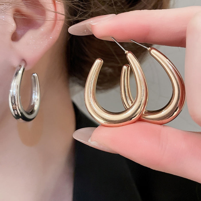 Minimalist U Shaped Iron Hoop Earrings With Smooth Oval Metal Stud Design For Women