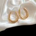 Minimalist U Shaped Iron Hoop Earrings With Smooth Oval Metal Stud Design For Women view 4