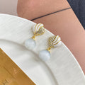 Elegant White Cat Eye Stone Pearl Drop With Rhinestone Inlaid Gold Alloy Enamel Shell Stud Earrings view 3