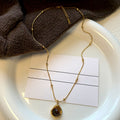 Vintage Stainless Steel Tiger Eye Geometric Round Pendant Maillard Style Sweater Necklace view 3