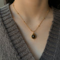 Vintage Stainless Steel Tiger Eye Geometric Round Pendant Maillard Style Sweater Necklace view 2