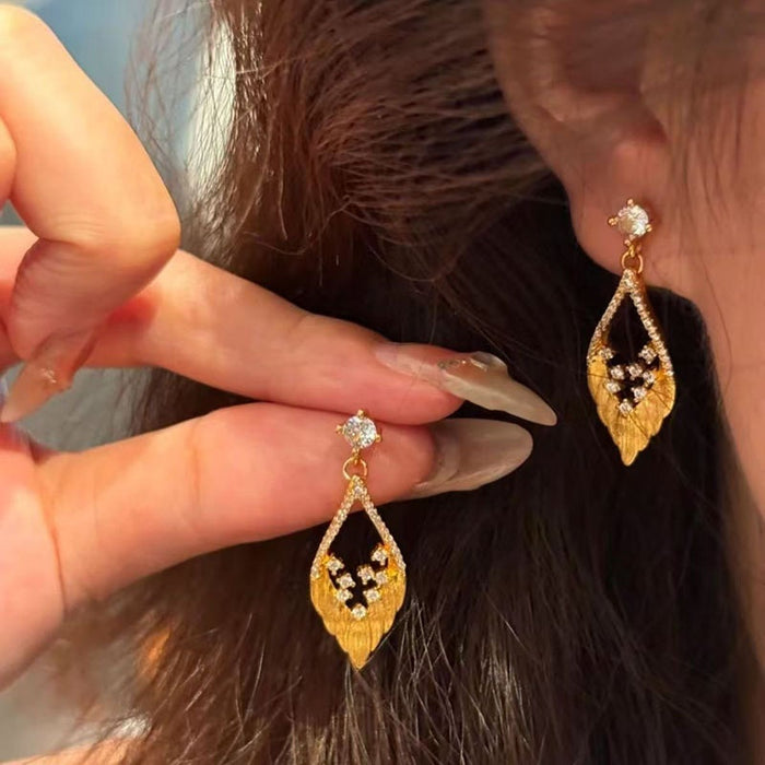 European Court Style Silver Needle Rhinestone Hollow Leaf Drop Earrings