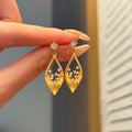 European Court Style Silver Needle Rhinestone Hollow Leaf Drop Earrings view 2