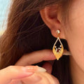 European Court Style Silver Needle Rhinestone Hollow Leaf Drop Earrings view 3