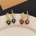 Korean Light Luxury Gold Alloy Knot Hoop Studs With Enamel Heart Charm Women's Fashion Earrings view 4