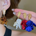 Acrylic Flower Petal Tassel Drop Earrings With Silver Needle Maillard Style Statement Design view 2