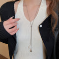 Minimalist Light Luxury Copper Adjustable Sweater Necklace With White Jade Teardrop Pendant view 3