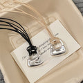 Minimalist Brushed Alloy Hollow Geometric Square Pendant Sweater Necklace With Cool Metal Style view 4