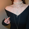 Light Luxury Faux Pearl Crystal Cross Pendant Necklace Elegant Rhinestone Geometric Sweater Chain view 3