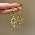 Style Copper Geometric Hollow Round Wrapped Pendant Drop Earrings For Women view 1