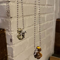 Stainless Steel Tiger Eye Planet Pony Pendant Sweater Necklace For Women Vacation Style view 1