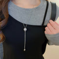 Light Luxury Copper Zircon Geometric Round Pendant Adjustable Sweater Necklace For Women view 3