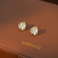 Luxury French Palace Style Gold Alloy Zircon Leaf Studs Sparkling Rhinestone Elegant Women's Earrings view 4