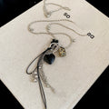 Light Luxury Glass Crystal Heart Geometric Pendant Tassel Sweater Necklace view 4