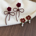Light Luxury Alloy Bow Rose Flower Pearl Pendant Drop Earrings For Women view 1