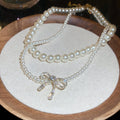 Light Luxury Faux Pearl Beaded Bow Pendant Two Piece Necklace Elegant Zircon Choker view 2