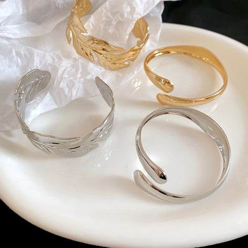 European American Glossy Metal Crossed Teardrop Leaf Open Bangle Fashion Jewelry