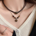 Light Luxury Vintage Tiger Eye Round Geometric Pendant Sweater Necklace For Women view 1