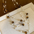 Vintage Maillard Resin Tiger Eye Pearl Beaded Geometric Pendant Sweater Necklace For Women view 4