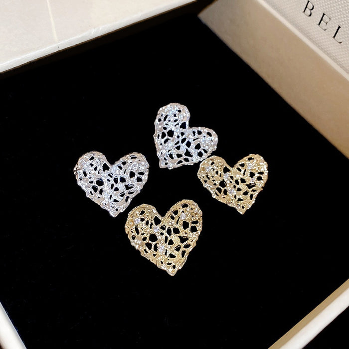 Light Luxury Zircon Heart Hollow Metal Stud Earrings With Silver Pins