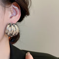 European Style Iron Geometric Round Stud Earrings With Layered Texture Smooth Finish view 3