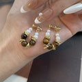 Vintage Maillard Cat Eye Stone Pearl Geometric Hoop Earrings For Women Elegant Alloy Stud Earrings view 2