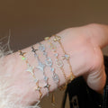 Light Luxury Copper Bangle With Sparkling Zircon Round Cross Star Pendant view 1