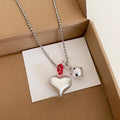 Light Luxury Faux Pearl Heart Pendant Crystal Sweater Necklace With Brushed Round Charm view 2