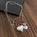 Light Luxury Faux Pearl Heart Pendant Crystal Sweater Necklace With Brushed Round Charm view 4