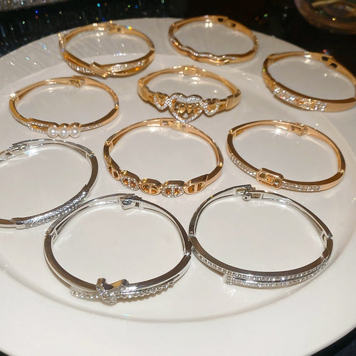 Light Luxury Alloy Bangle With Rhinestone Nail Cross Design And Round Clasp
