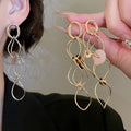 Copper Hollow Round Tassel Clip-on Earrings European Style Geometric Metal Dangle view 2