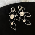 Copper Hollow Round Tassel Clip-on Earrings European Style Geometric Metal Dangle view 3