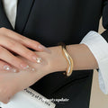 European American Alloy Smooth Wave Open Bangle For Women, Minimalist Metallic Round Jewelry view 3