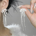 Elegant Copper Bow Tassel Earrings With Silver Needle And Zircon Accents view 1