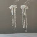 Elegant Copper Bow Tassel Earrings With Silver Needle And Zircon Accents view 2