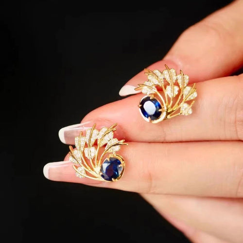 Old Money Style Feather Leaf Stud Earrings With Oval Blue Sapphire Accent Designer Accessories