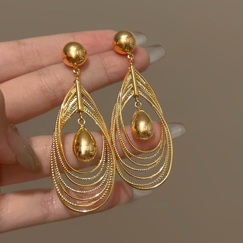Light Luxury Metal Multi Layer Hollow Teardrop Twist Pendant Drop Earrings For Women