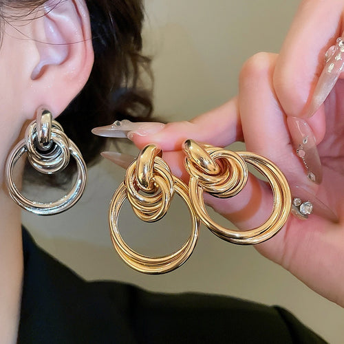 European Style Glossy Iron Knot Round Pendant Drop Earrings With Silver Tone Posts