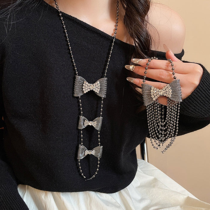 Light Luxury Copper Rhinestone Bow Pendant Tassel Necklace Dark Glam Sweater Chain