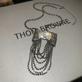 Light Luxury Copper Rhinestone Bow Pendant Tassel Necklace Dark Glam Sweater Chain view 4