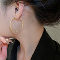 Metal Smooth Twisted Geometric Hoop Earrings For Women Minimalist European Style view 4