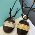 New Chinese Style Leather And Wood Oval Pendant Sweater Necklace Ethnic Retro Long Chain view 2