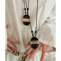 New Chinese Style Leather And Wood Oval Pendant Sweater Necklace Ethnic Retro Long Chain view 1