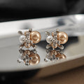 Elegant French Floral Pearl Stud Earrings With Rhinestone Inlaid Alloy Flower Cluster Luxury Earrings view 4