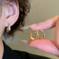 18K Gold Plated Copper U Shape Oval Stud Earrings Minimalist Luxury Style For Women view 2